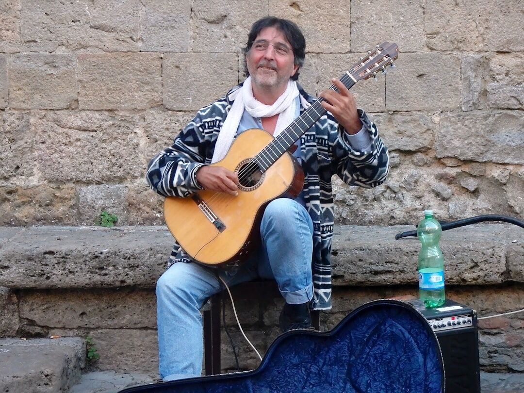 gaucho playing guitar