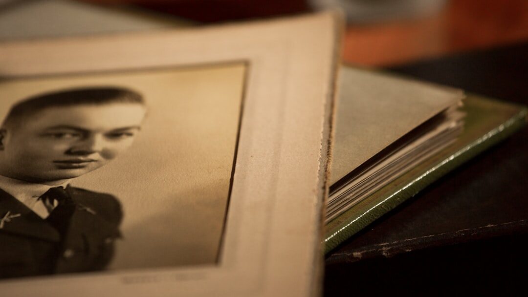Portrait of a Latin American male historian with gray beard and glasses